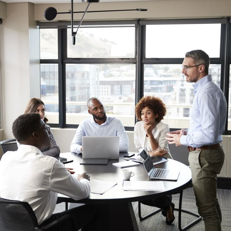 workers in the office discussing